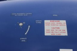 Многочисленные инструкции и указатели на самолете SSJ-100 в Хабаровском аэропорту